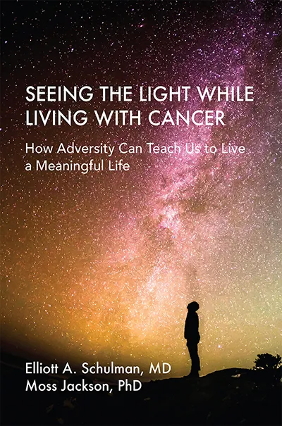 The cover of the book 'Seeing The Light While Living With Cancer' with a person staring at the stars